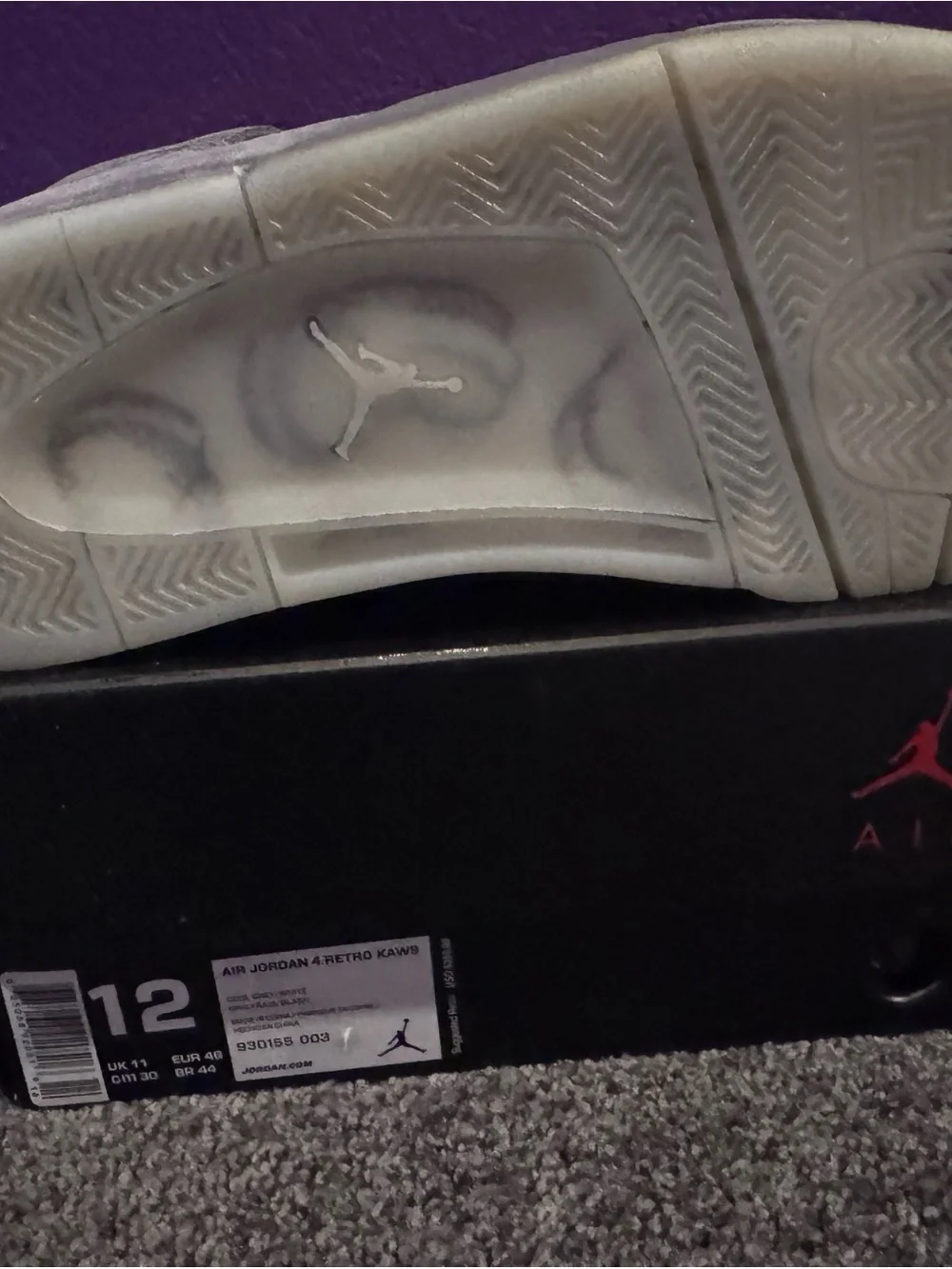 Jordan 4 Retro KAWS Men’s Grey Suede Sneakers